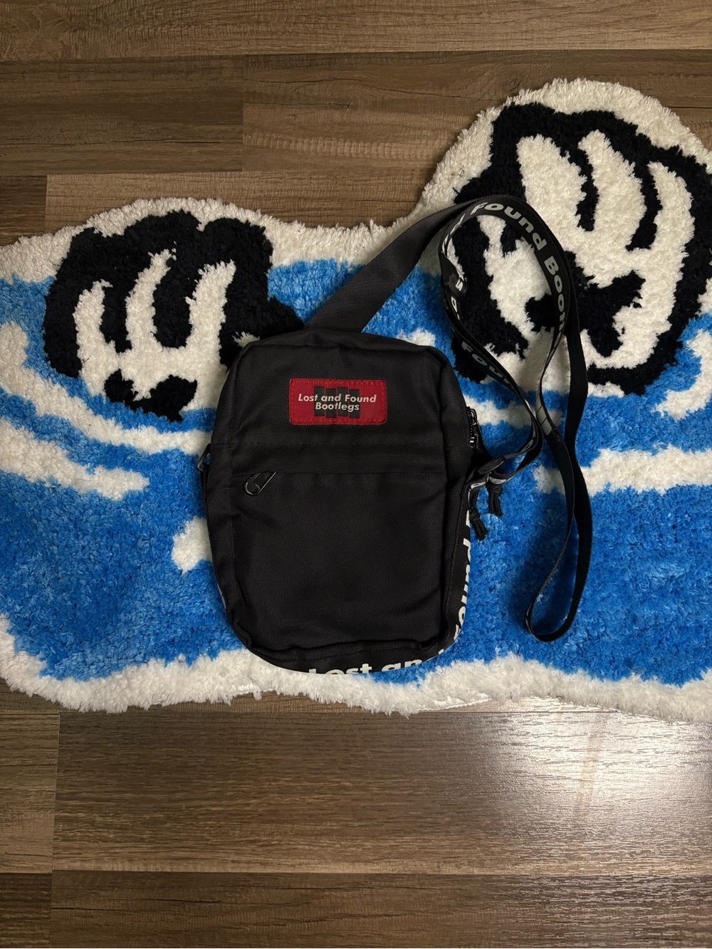 Lost and Found Bootlegs Black Crossbody Bag Logo Strap Zip Adjustable Pockets